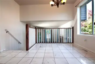 The Eat in Kitchen space with Exquisite Marble floors Overlooks the Family room.