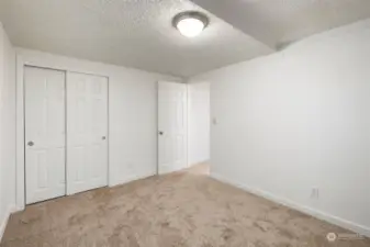 Bedroom one with ample closet space.