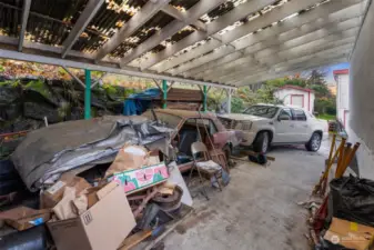 Carport leading to 840 nsq ft shop