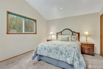 2nd upstairs bedroom with vaulted ceiling.