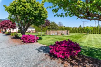 The park-like yard has been meticulously maintained by proud owners.