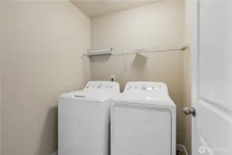 Upstair Laundry area with washer and dryer included.