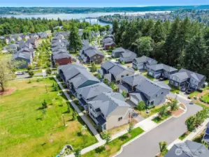 Right across from neighborhood park/grassy area and just a stroll to the water.