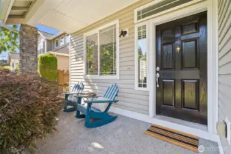 Inviting covered front porch to sit, relax and say hello to your neighbors.