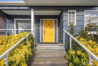 Covered front entry porch.  Enough room to setup some chairs and enjoy the evening sunset facing West to the Sound and Olympic Mountains.