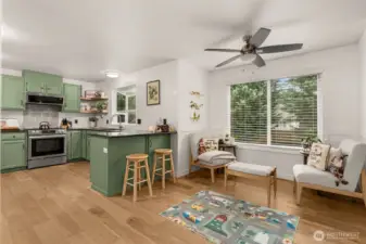 Large area next to kitchen maintaining the open-concept throughout.