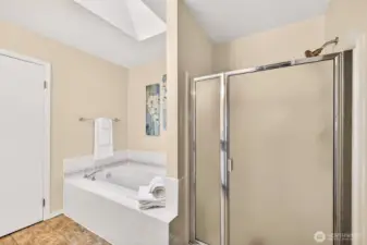 Enjoy a spa style setup with a deep soaking tub plus a separate shower, giving you options for quick starts or slower evenings. Tile surfaces keep the space practical and easy to maintain.