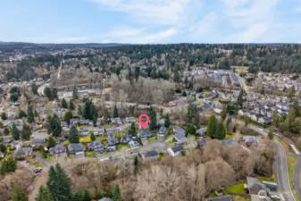 This aerial view places the home within a well established North Bothell neighborhood, surrounded by mature trees and nearby residential streets. Enjoy the convenience of Northshore School District, with quick connections to shopping, dining, and major commute routes.