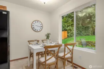 Dine overlooking the gorgeous back yard.