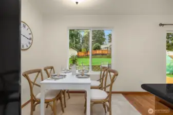 A view from the kitchen to the dining area.