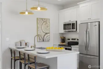 Spacious kitchen with ample storage and soft-close cabinetry