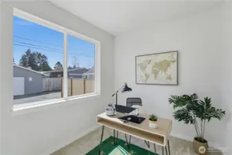 Main-level bedroom with natural light and flexible use