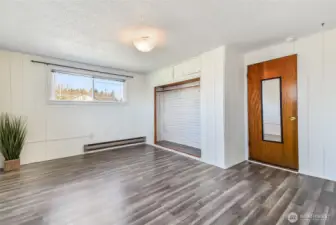Primary bedroom separate from the additional two bedrooms.