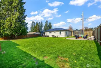 All new, fully fenced back yard with firepit!