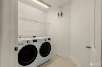 LARGE laundry/utility room. Huge turning radius and lots of storage space.