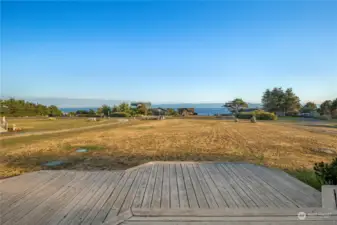 Multi-level deck with scenic views of the Strait of Juan de Fuca and the Olympic Peninsula.