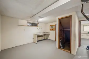 This room on the lower level is plumbed and wired for a second kitchen.