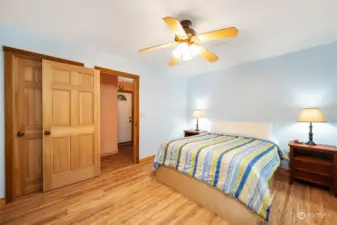 Main floor primary bedroom with attached bathroom