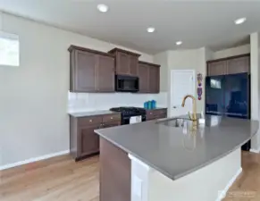 Kitchen with mural virtually removed