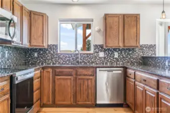 Shinny Updated Kitchen with New Range | View from Kitchen Window