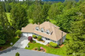 !st time on market. Original owners! Tucked at the end of a cul-de-sac sits this beautiful home on the 2nd hole of one of NW premier country clubs