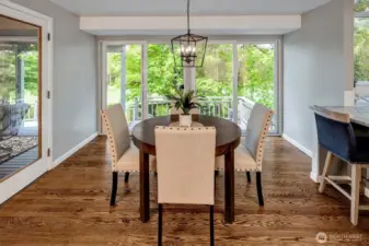 Inviting nook area with sliding doors to the massive deck