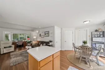 The open layout flows seamlessly into the kitchen, creating a bright and connected living space.
