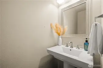 Updated half bath on the main floor.