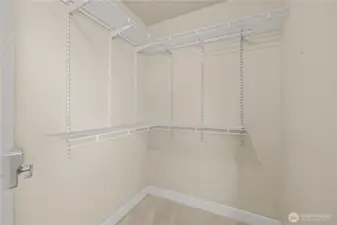 Primary Bedroom includes walk in closet, ensuite 5-piece bathroom w/soaking tub.