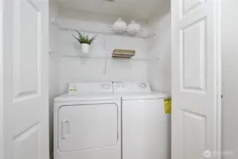 Side-by-side washer and dryer in the unit.  All appliances stay.