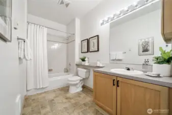 Another full bath near the 2nd bedroom, opposite the primary suite.