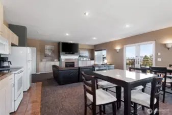 The top floor penthouse community room has great views of downtown, the golf course and Mount Rainier.