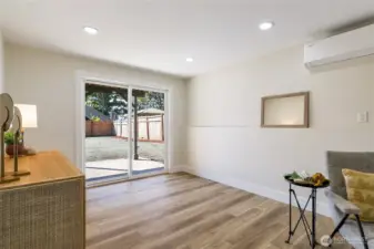 sliding glass doors lead to backyard