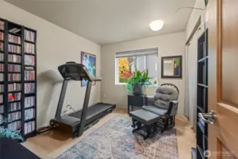 2nd of 3 bedrooms upstairs. Plenty of room to exercise if that's what you need!