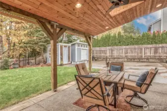 Covered patio with skylights invites backyard gatherings!