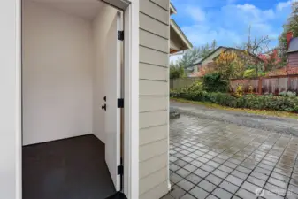 Additional 51-square foot bike / storage shed NOT included in the total square footage next the to the EV-ready parking space off alley.