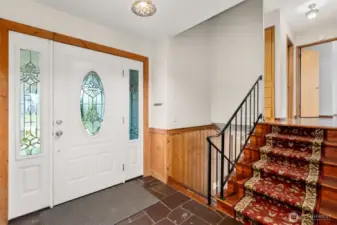 A welcoming entry with attractive slate flooring that stands up beautifully to high-traffic use.