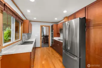 Thoughtfully updated kitchen with modern appliances, new countertops, and plenty of cabinet storage. Designed for both function and style, it’s an ideal space for meal prep, morning coffee, and family dinners.