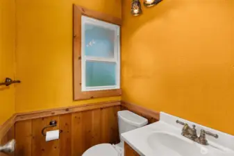 A convenient main-level half bath—perfectly located for guests and everyday use it is super convenient when you are working outside.