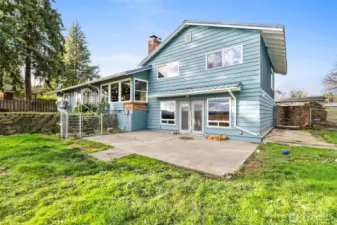 Patio outside the basement offers the perfect spot for summer dining and outdoor relaxation.