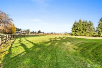 A spacious field provides flexibility for pasture, additional gardening, or maybe adding a greenhouse or two. It is hard to find this much land so close to town and within walking distance of the hospital.