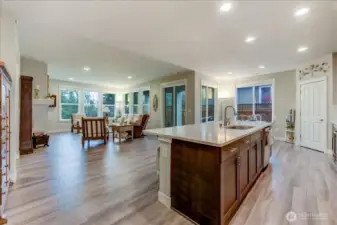 Open Concept Kitchen, Dining, & Living Room with Gas Fireplace