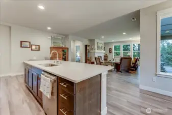 Open Concept Kitchen, Dining, & Living Room with Gas Fireplace