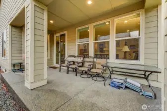 Spacious Covered Patio at back of home, fully fenced in back yard, beautifully landscaped, & raised garden beds