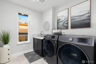 Large laundry w/ sink and storage
