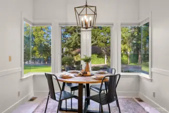 Custom curved glass windows in nook showcase thoughtful design.