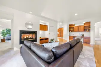Family room with gas fireplace, media storage.