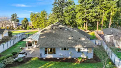 Rear view of home showcasing stunning water views.