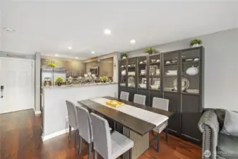 Dining Room between Kitchen and Living Room. Family and friends can mingle in this great room concept.