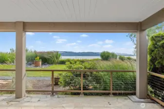 Covered patio area off primary bedroom.  Amazing views.